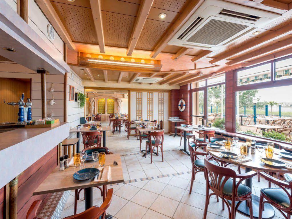 Le Mesnil-en-Vallée Logis Hotels - Au Poisson D'Argent - Hotel 3 Etoiles Et Restaurant מראה חיצוני תמונה